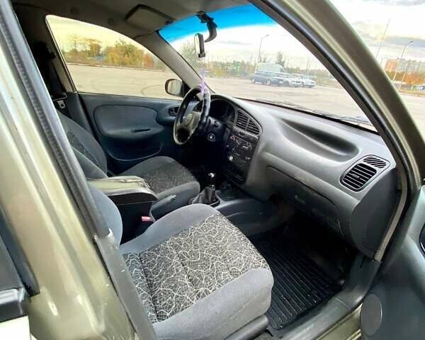 Зелений Деу Ланос, об'ємом двигуна 1.5 л та пробігом 257 тис. км за 2400 $, фото 8 на Automoto.ua