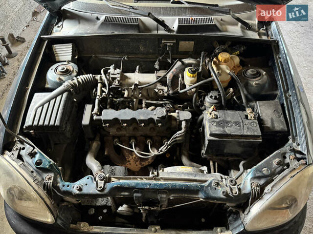 Зеленый Дэу Ланос, объемом двигателя 1.5 л и пробегом 104 тыс. км за 1850 $, фото 8 на Automoto.ua