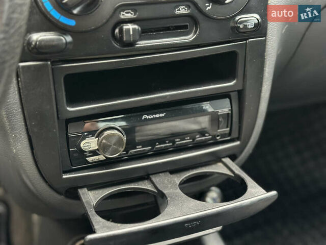 Зелений Деу Ланос, об'ємом двигуна 1.5 л та пробігом 241 тис. км за 2250 $, фото 39 на Automoto.ua