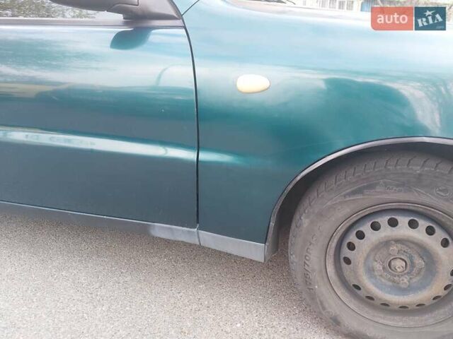 Дэу Ланос 2004 в Киеве на Automoto.ua Зеленый Дэу Ланос, объемом двигателя 1.5 л и пробегом 256 тыс. км за 2600 $, фото 5 на Automoto.ua