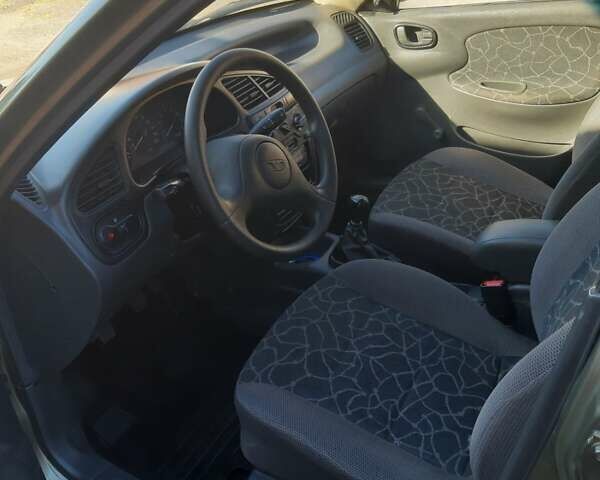 Зеленый Дэу Ланос, объемом двигателя 1.5 л и пробегом 222 тыс. км за 2600 $, фото 10 на Automoto.ua