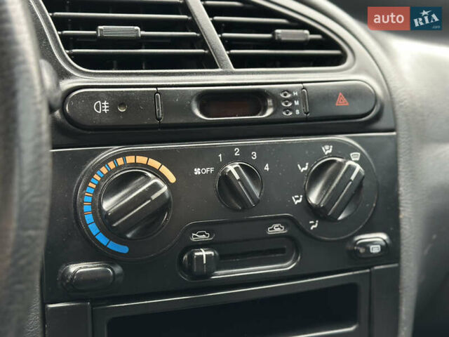 Зелений Деу Ланос, об'ємом двигуна 1.5 л та пробігом 241 тис. км за 2250 $, фото 38 на Automoto.ua