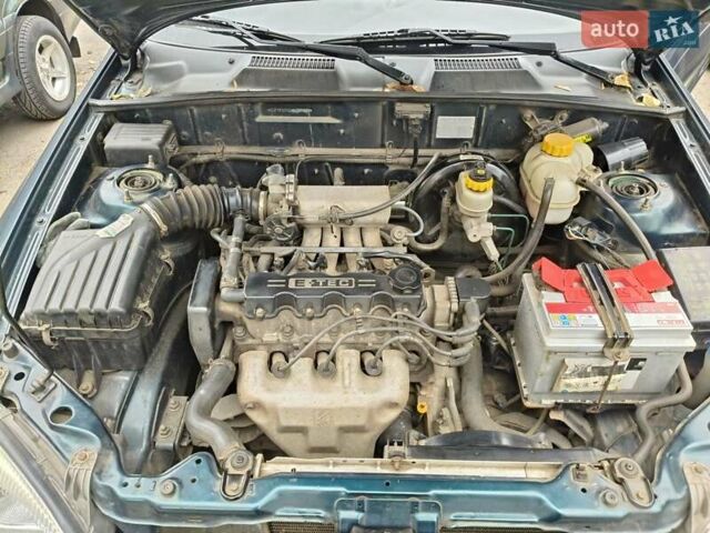 Деу Ланос 2004 у Кривому Розі на Automoto.ua Зелений Деу Ланос, об'ємом двигуна 1.5 л та пробігом 184 тис. км за 3100 $, фото 9 на Automoto.ua