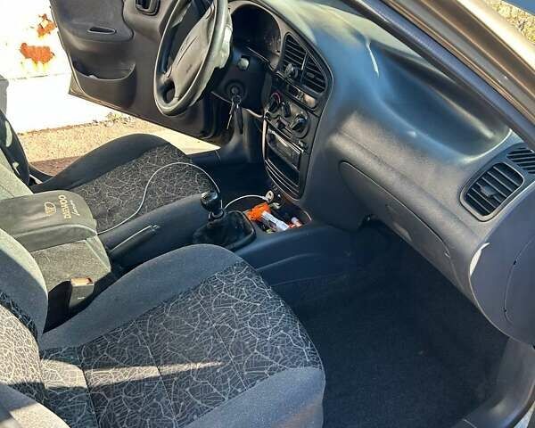 Зеленый Дэу Ланос, объемом двигателя 1.6 л и пробегом 350 тыс. км за 3000 $, фото 7 на Automoto.ua