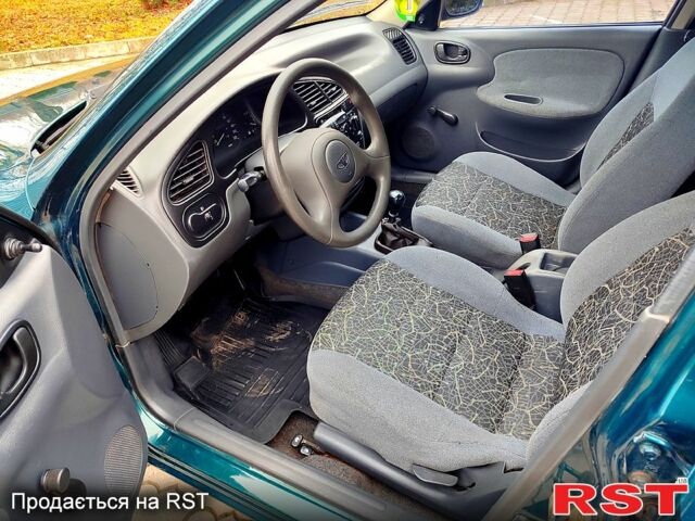 Зеленый Дэу Ланос, объемом двигателя 1.5 л и пробегом 185 тыс. км за 2750 $, фото 4 на Automoto.ua