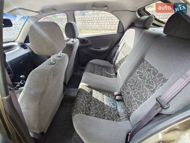 Зеленый Дэу Ланос, объемом двигателя 1.5 л и пробегом 130 тыс. км за 2600 $, фото 6 на Automoto.ua