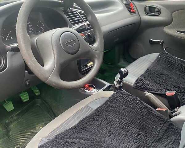 Зеленый Дэу Ланос, объемом двигателя 1.5 л и пробегом 183 тыс. км за 2000 $, фото 14 на Automoto.ua