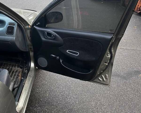 Зеленый Дэу Ланос, объемом двигателя 1.35 л и пробегом 190 тыс. км за 1888 $, фото 3 на Automoto.ua