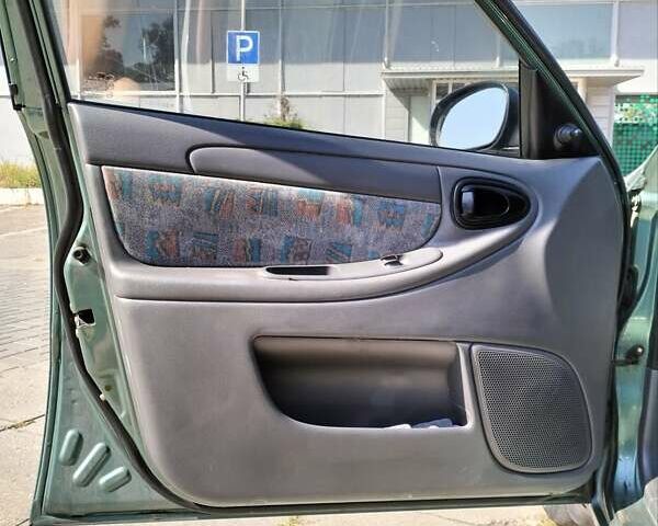 Зеленый Дэу Ланос, объемом двигателя 1.6 л и пробегом 200 тыс. км за 2900 $, фото 5 на Automoto.ua