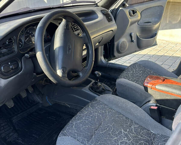 Зеленый Дэу Ланос, объемом двигателя 1.3 л и пробегом 385 тыс. км за 1250 $, фото 9 на Automoto.ua