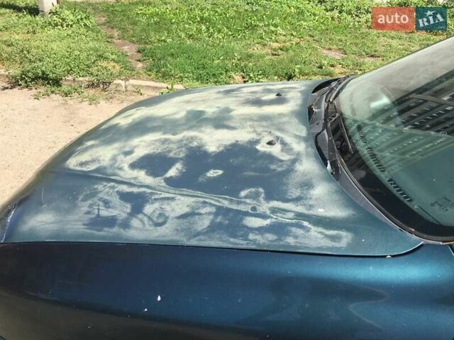 Зеленый Дэу Ланос, объемом двигателя 1.5 л и пробегом 215 тыс. км за 1300 $, фото 4 на Automoto.ua