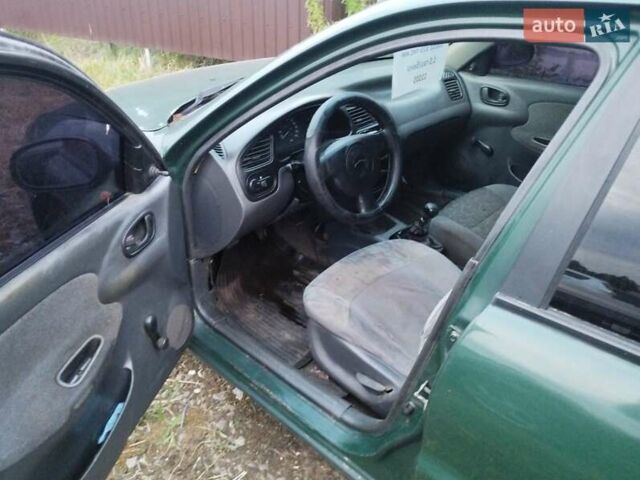 Дэу Ланос 2005 в Шепетовке на Automoto.ua Зеленый Дэу Ланос, объемом двигателя 1.5 л и пробегом 180 тыс. км за 1200 $, фото 2 на Automoto.ua