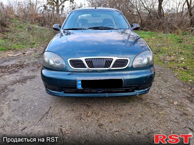 Зеленый Дэу Ланос, объемом двигателя 1.5 л и пробегом 180 тыс. км за 1150 $, фото 4 на Automoto.ua