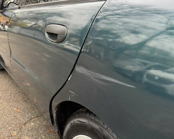 Зелений Деу Ланос, об'ємом двигуна 1.5 л та пробігом 244 тис. км за 2350 $, фото 10 на Automoto.ua