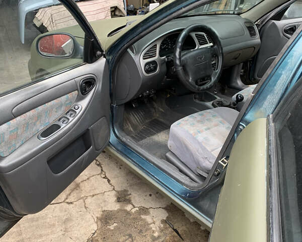 Зелений Деу Ланос, об'ємом двигуна 1.6 л та пробігом 248 тис. км за 2500 $, фото 9 на Automoto.ua