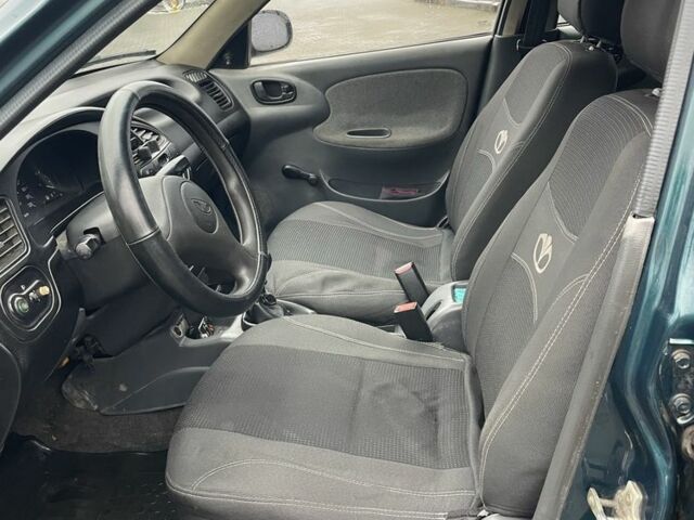 Зеленый Дэу Ланос, объемом двигателя 1.5 л и пробегом 400 тыс. км за 1450 $, фото 5 на Automoto.ua