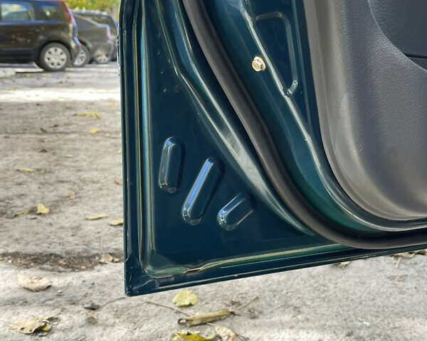 Дэу Ланос 2005 в Каменце-Подольском на Automoto.ua Зеленый Дэу Ланос, объемом двигателя 1.5 л и пробегом 223 тыс. км за 2599 $, фото 14 на Automoto.ua