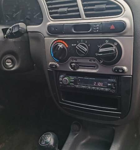 Зеленый Дэу Ланос, объемом двигателя 1.6 л и пробегом 291 тыс. км за 1999 $, фото 1 на Automoto.ua