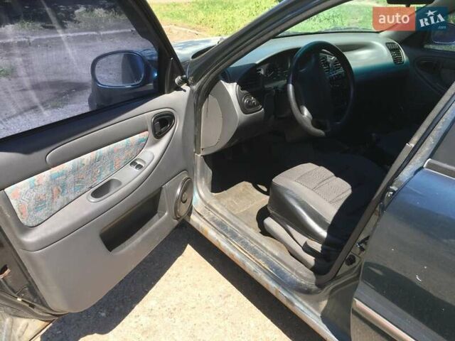 Зеленый Дэу Ланос, объемом двигателя 1.5 л и пробегом 215 тыс. км за 1300 $, фото 13 на Automoto.ua