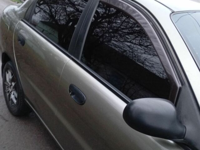 Зеленый Дэу Ланос, объемом двигателя 1.5 л и пробегом 255 тыс. км за 1774 $, фото 4 на Automoto.ua