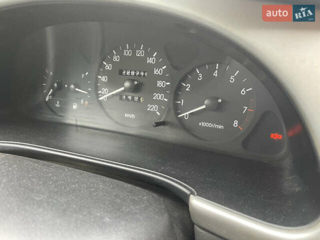 Зеленый Дэу Ланос, объемом двигателя 1.6 л и пробегом 233 тыс. км за 1900 $, фото 3 на Automoto.ua