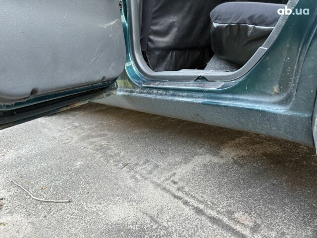 Зелений Деу Ланос, об'ємом двигуна 1.5 л та пробігом 209 тис. км за 2200 $, фото 18 на Automoto.ua