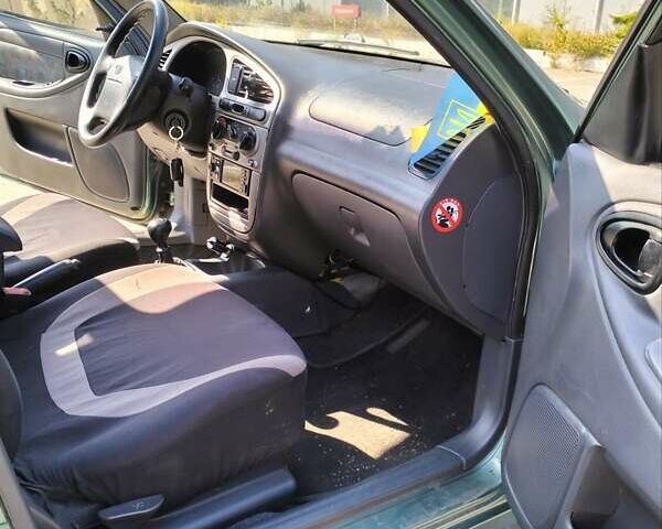 Зеленый Дэу Ланос, объемом двигателя 1.6 л и пробегом 200 тыс. км за 2900 $, фото 6 на Automoto.ua