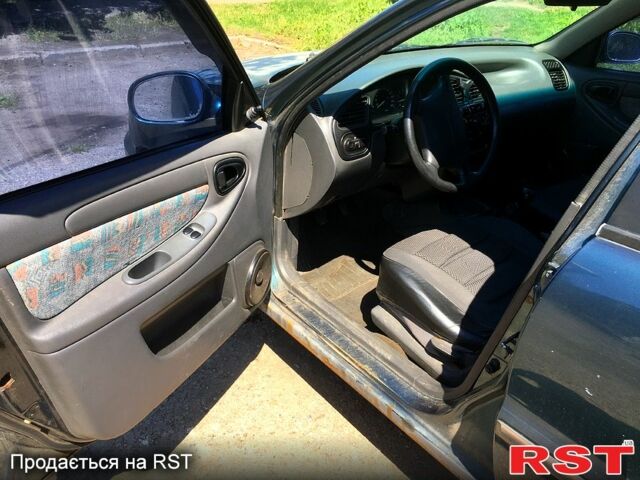 Зелений Деу Ланос, об'ємом двигуна 1.6 л та пробігом 215 тис. км за 1300 $, фото 8 на Automoto.ua