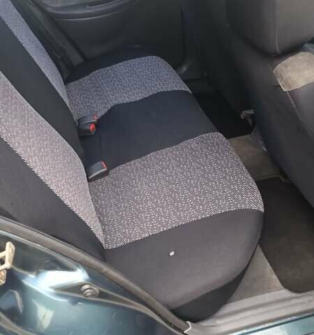 Зеленый Дэу Ланос, объемом двигателя 1.6 л и пробегом 291 тыс. км за 1999 $, фото 2 на Automoto.ua