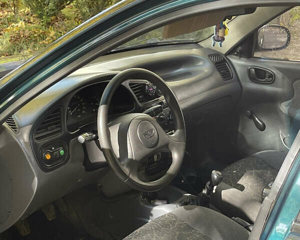 Дэу Ланос 2005 в Каменце-Подольском на Automoto.ua Зеленый Дэу Ланос, объемом двигателя 1.5 л и пробегом 223 тыс. км за 2599 $, фото 11 на Automoto.ua