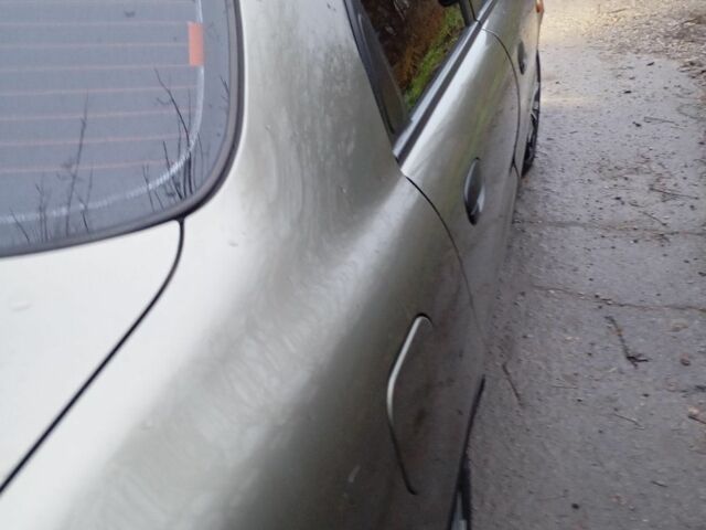 Зеленый Дэу Ланос, объемом двигателя 1.5 л и пробегом 255 тыс. км за 1774 $, фото 1 на Automoto.ua