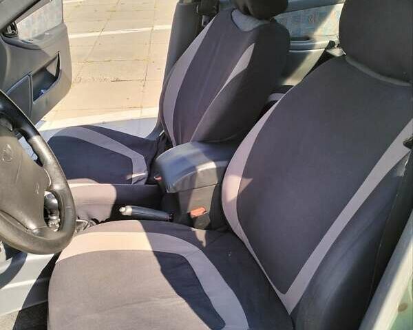 Зеленый Дэу Ланос, объемом двигателя 1.6 л и пробегом 200 тыс. км за 2900 $, фото 7 на Automoto.ua