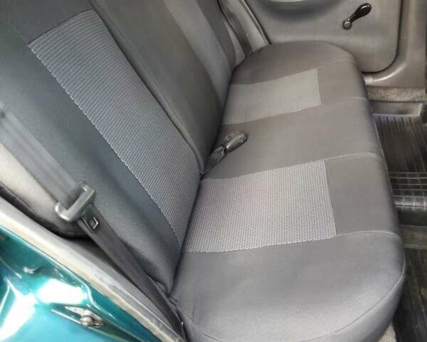 Дэу Ланос 2005 в Ивано-Франковске на Automoto.ua Зеленый Дэу Ланос, объемом двигателя 1.5 л и пробегом 158 тыс. км за 2100 $, фото 26 на Automoto.ua