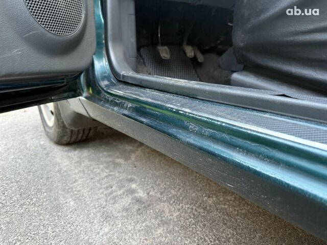 Зелений Деу Ланос, об'ємом двигуна 1.5 л та пробігом 209 тис. км за 2200 $, фото 8 на Automoto.ua