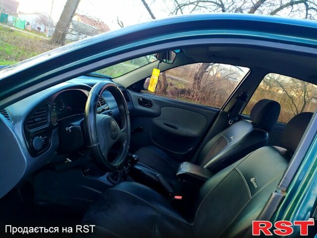 Зеленый Дэу Ланос, объемом двигателя 1.5 л и пробегом 203 тыс. км за 2500 $, фото 6 на Automoto.ua
