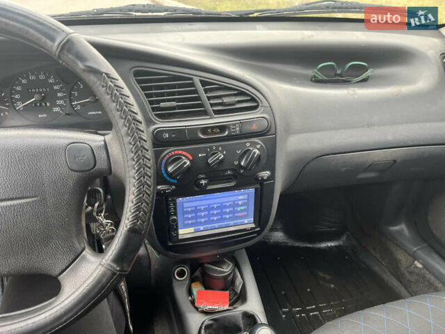 Зеленый Дэу Ланос, объемом двигателя 1.6 л и пробегом 133 тыс. км за 3500 $, фото 6 на Automoto.ua