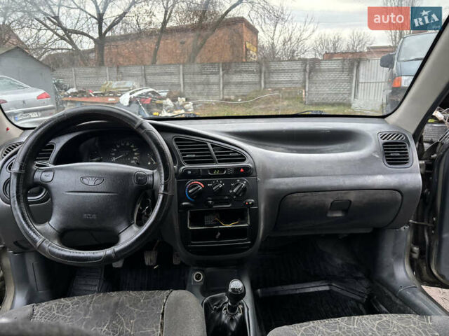 Зеленый Дэу Ланос, объемом двигателя 1.5 л и пробегом 335 тыс. км за 1300 $, фото 10 на Automoto.ua