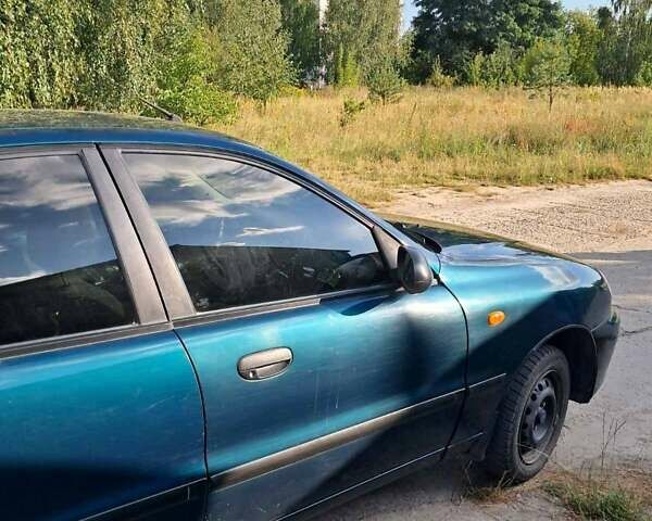 Зелений Деу Ланос, об'ємом двигуна 1.5 л та пробігом 138 тис. км за 2500 $, фото 3 на Automoto.ua