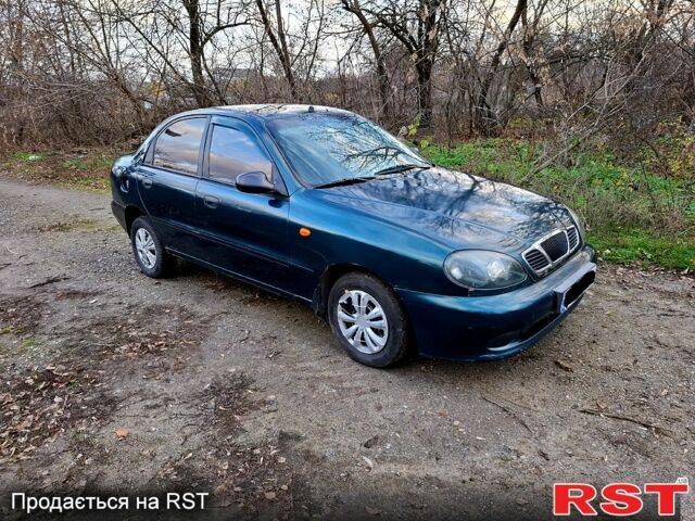 Зеленый Дэу Ланос, объемом двигателя 1.5 л и пробегом 180 тыс. км за 1150 $, фото 5 на Automoto.ua