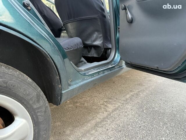 Зелений Деу Ланос, об'ємом двигуна 1.5 л та пробігом 209 тис. км за 2200 $, фото 16 на Automoto.ua