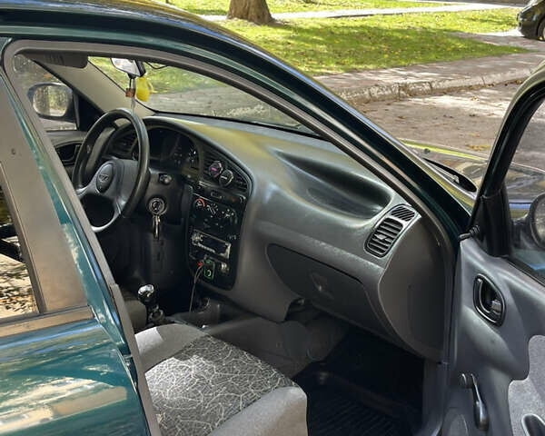 Дэу Ланос 2005 в Каменце-Подольском на Automoto.ua Зеленый Дэу Ланос, объемом двигателя 1.5 л и пробегом 223 тыс. км за 2599 $, фото 12 на Automoto.ua