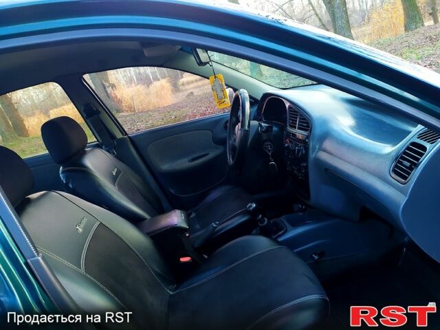 Зеленый Дэу Ланос, объемом двигателя 1.5 л и пробегом 203 тыс. км за 2500 $, фото 8 на Automoto.ua