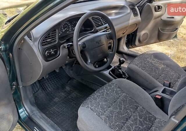 Зелений Деу Ланос, об'ємом двигуна 1.6 л та пробігом 201 тис. км за 2999 $, фото 10 на Automoto.ua