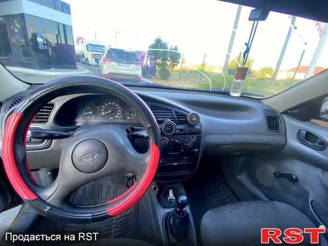 Зеленый Дэу Ланос, объемом двигателя 1.5 л и пробегом 264 тыс. км за 950 $, фото 6 на Automoto.ua