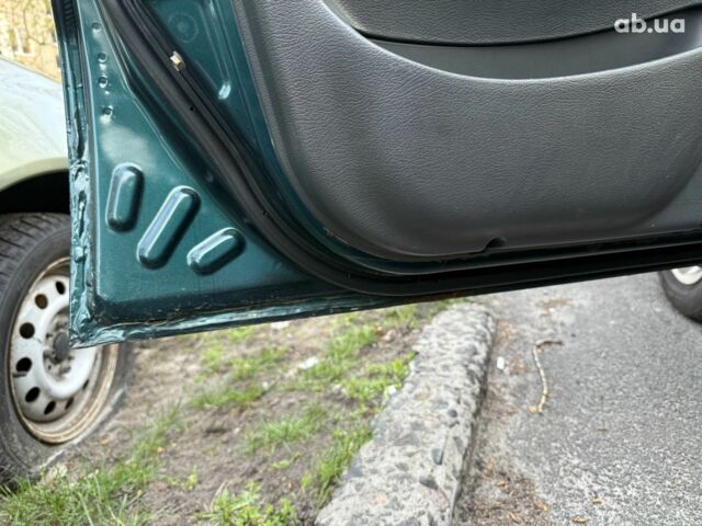 Зелений Деу Ланос, об'ємом двигуна 1.5 л та пробігом 209 тис. км за 2200 $, фото 11 на Automoto.ua
