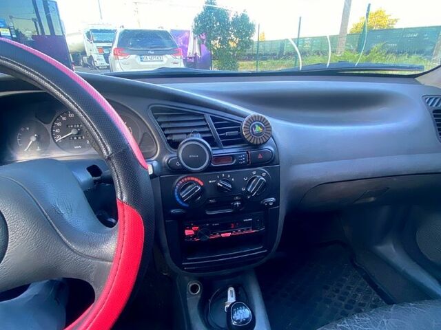 Зеленый Дэу Ланос, объемом двигателя 1.5 л и пробегом 264 тыс. км за 950 $, фото 2 на Automoto.ua