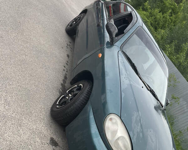 Зеленый Дэу Ланос, объемом двигателя 1.6 л и пробегом 233 тыс. км за 1900 $, фото 6 на Automoto.ua