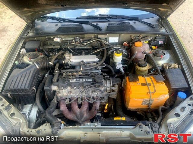 Зеленый Дэу Ланос, объемом двигателя 1.5 л и пробегом 175 тыс. км за 2499 $, фото 9 на Automoto.ua