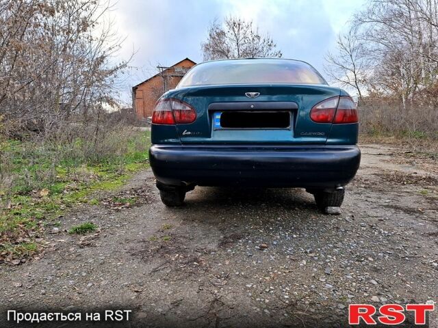 Зеленый Дэу Ланос, объемом двигателя 1.5 л и пробегом 180 тыс. км за 1150 $, фото 6 на Automoto.ua