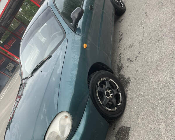 Зеленый Дэу Ланос, объемом двигателя 1.6 л и пробегом 233 тыс. км за 1900 $, фото 10 на Automoto.ua